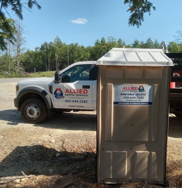 allied septic portable toilet and delivery truck